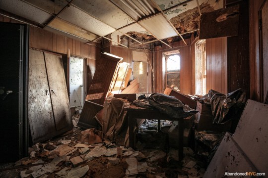 Burial records litter the floor of the 