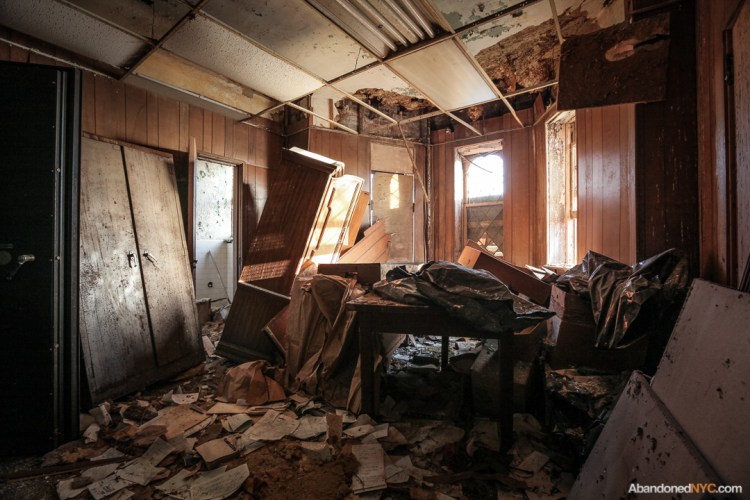 Burial records litter the floor of the 