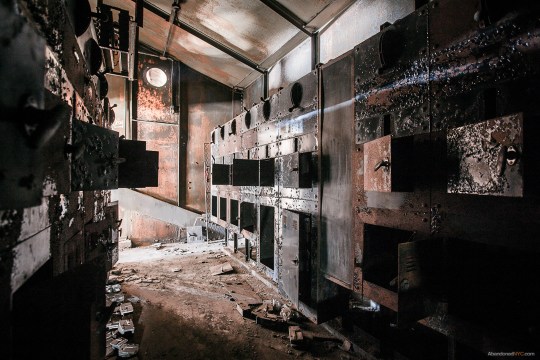 A dimly lit control room on the top floor where the coal entered the complex through a gigantic conveyor.