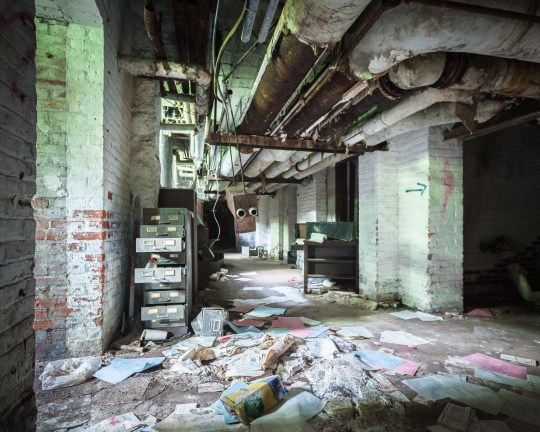 Files scattered underground in Essex County Hospital.