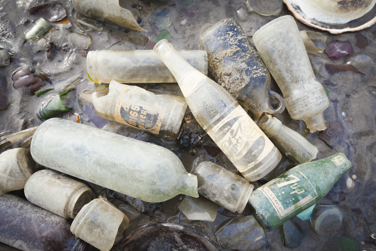 Familiar brand names among the old bottles.